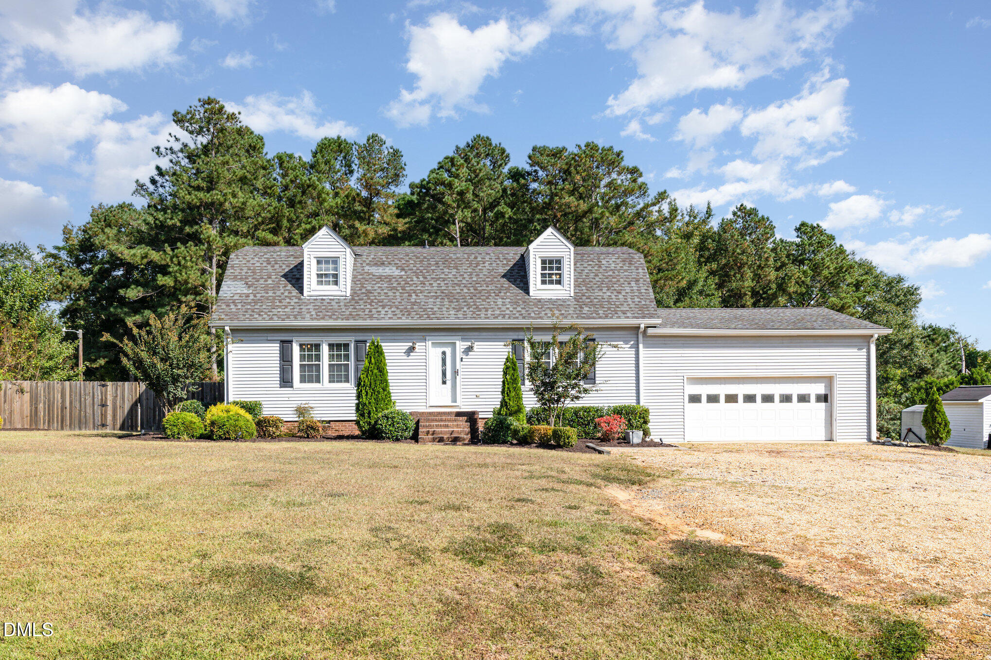 414 Aquilla Road Benson, NC 27504 - Photo 2 of 30 a front view of a building with street