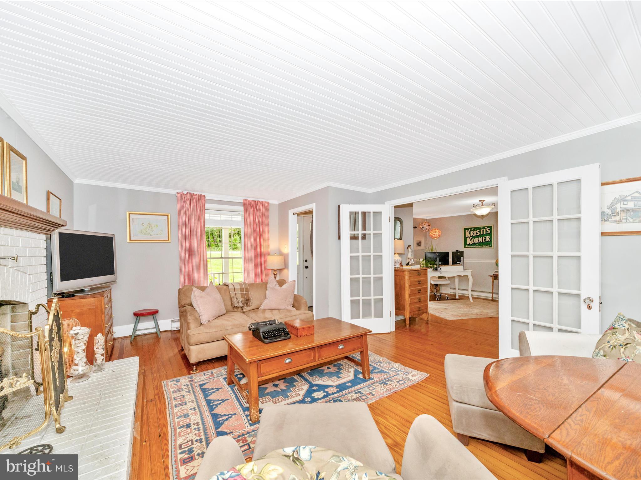 9000 Reichs Ford Road Frederick, MD 21704 - Photo 11 of 44 a living room with furniture and a flat screen tv with rug
