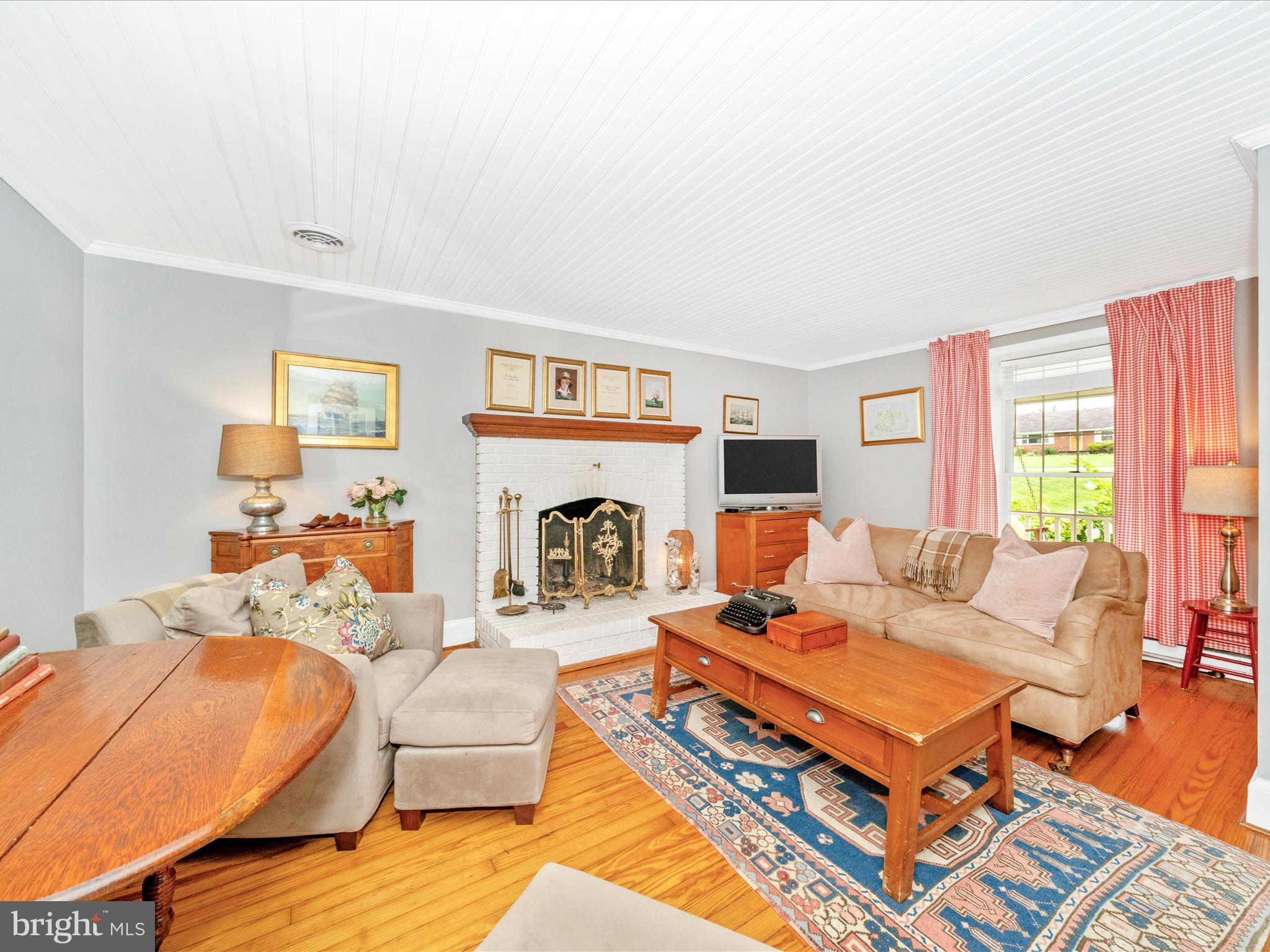 9000 Reichs Ford Road Frederick, MD 21704 - Photo 12 of 44 a living room with furniture fireplace and a table