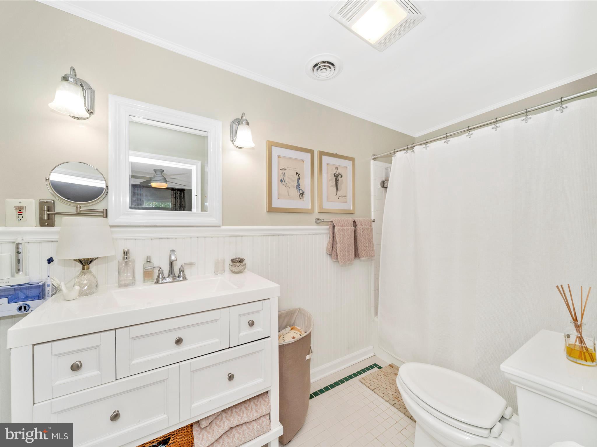 9000 Reichs Ford Road Frederick, MD 21704 - Photo 31 of 44 a bathroom with a toilet sink double vanity and mirror