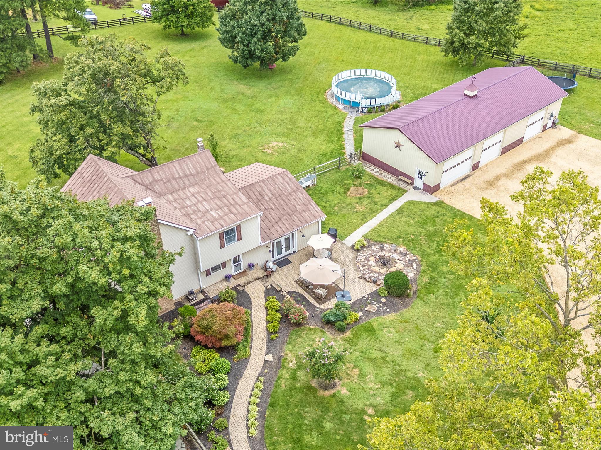 9000 Reichs Ford Road Frederick, MD 21704 - Photo 4 of 44 an aerial view of residential house with outdoor space and swimming pool