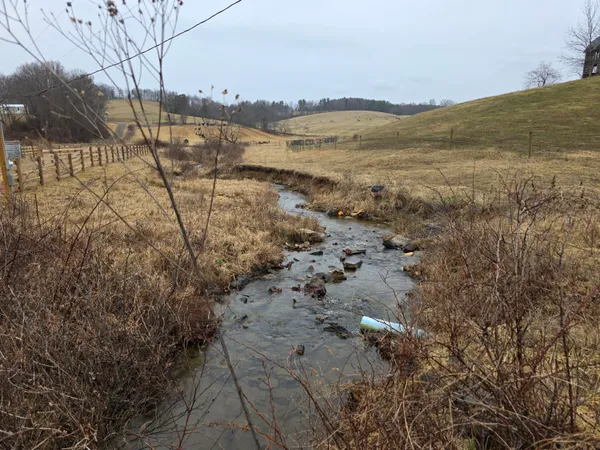 a view of lake with mountain