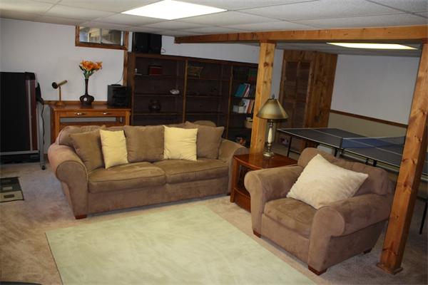 45 Tyler Road Townsend, MA 01469 - Photo 20 of 20 a living room with furniture and a flat screen tv