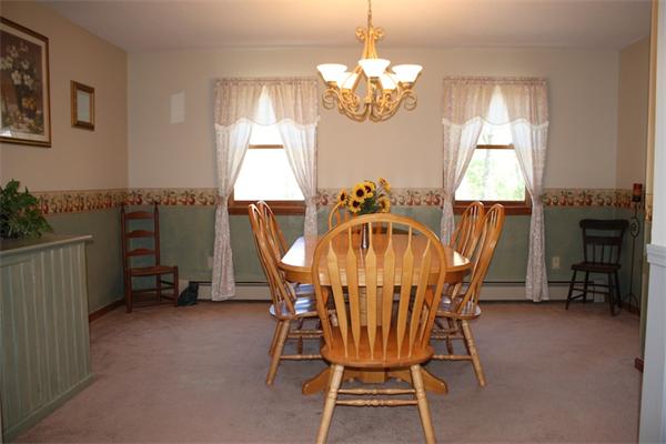 45 Tyler Road Townsend, MA 01469 - Photo 7 of 20 a view of a dining room with furniture window and wooden floor
