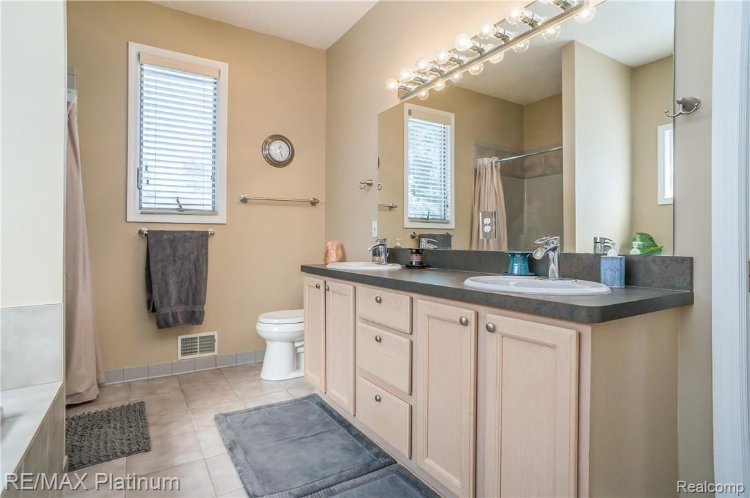 8433 Hyne Road Brighton, MI 48114 - Photo 17 of 39 Master Bathroom with Dual Vanities