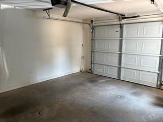 106 Antique Court Pendleton, SC 29670 - Photo 17 of 18 Ample space for vehicles and storage with a convenient automatic garage door.