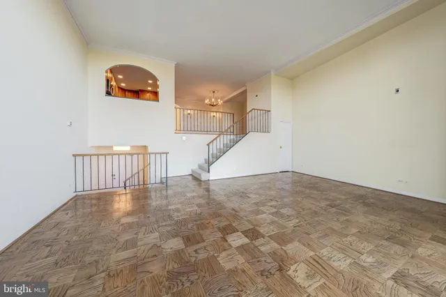 a kitchen with stainless steel appliances granite countertop a refrigerator and sink
