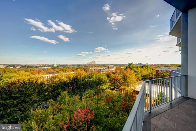 a view of a cars parked in front of a building