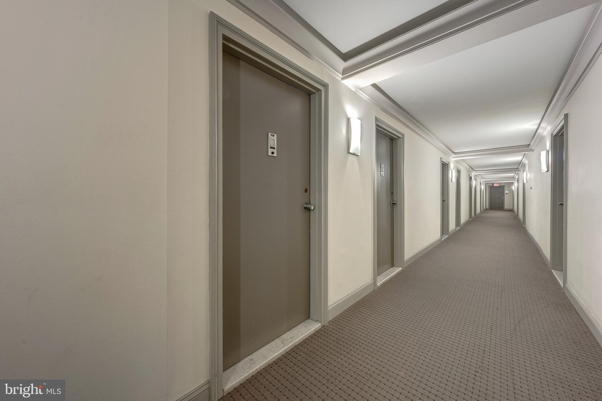 1200 North Nash Street, Unit 549 Arlington, VA 22209 - Photo 52 of 70 Building hallways are wide and bright.