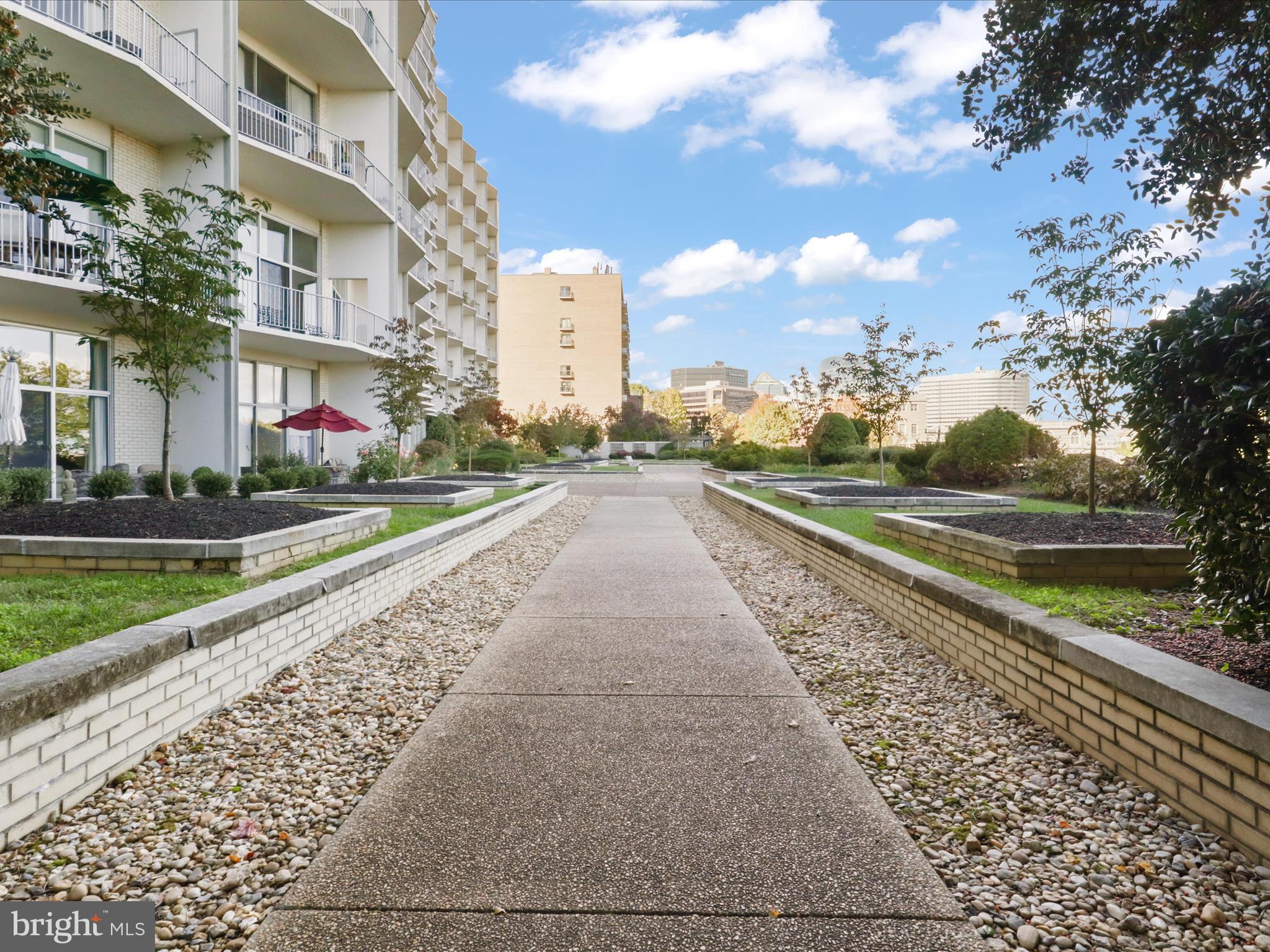 1200 North Nash Street, Unit 549 Arlington, VA 22209 - Photo 59 of 70 Manicured grounds frame the building with...
