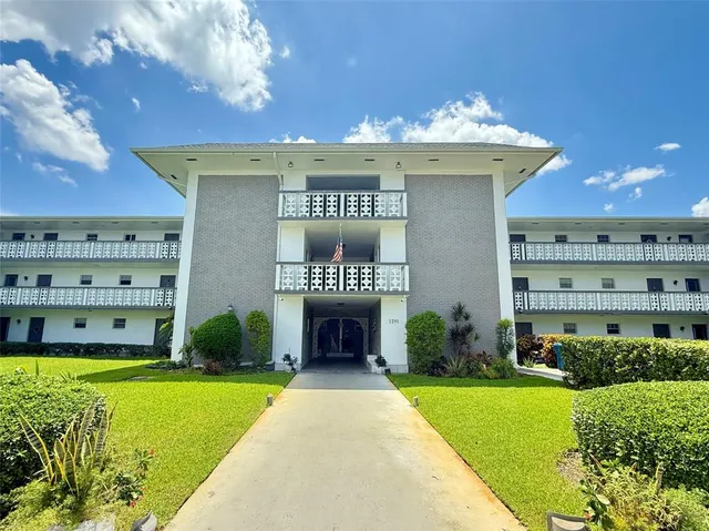 a view of a house with a swimming pool