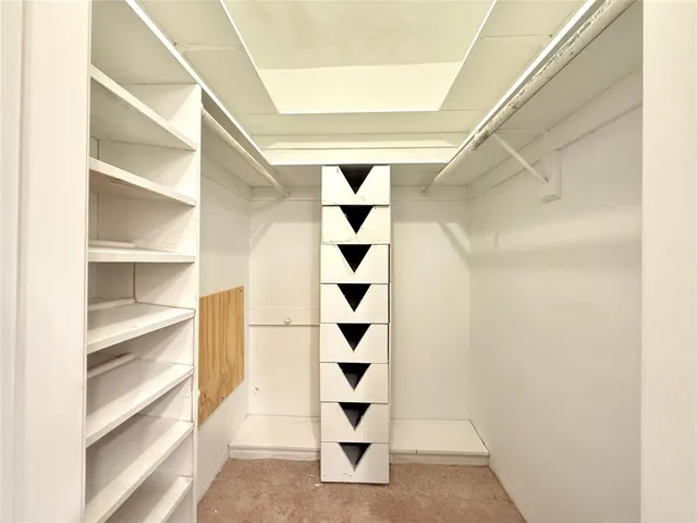 a view of a walk in closet