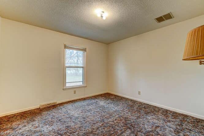 831 Wiley Lewis Road Greensboro, NC 27406 - Photo 15 of 20 1st bedroom