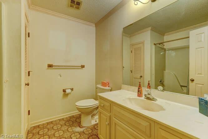 831 Wiley Lewis Road Greensboro, NC 27406 - Photo 17 of 20 hallway bathroom