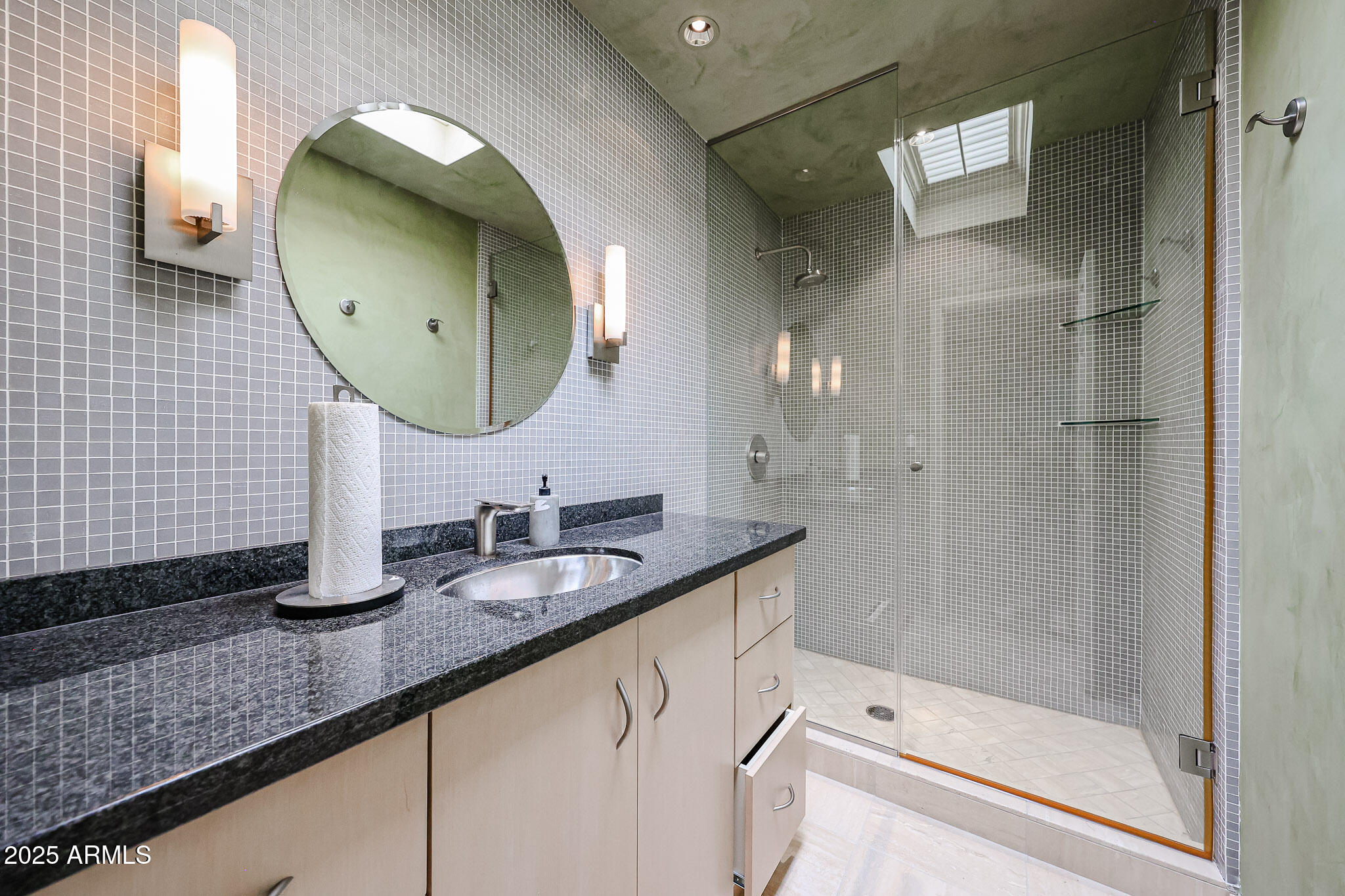 7834 East Ocotillo Road Scottsdale, AZ 85250 - Photo 13 of 47 a bathroom with a double vanity sink and mirror