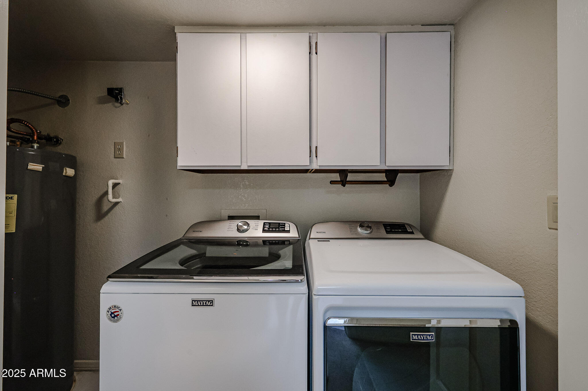7834 East Ocotillo Road Scottsdale, AZ 85250 - Photo 15 of 47 a utility room with dryer and washer