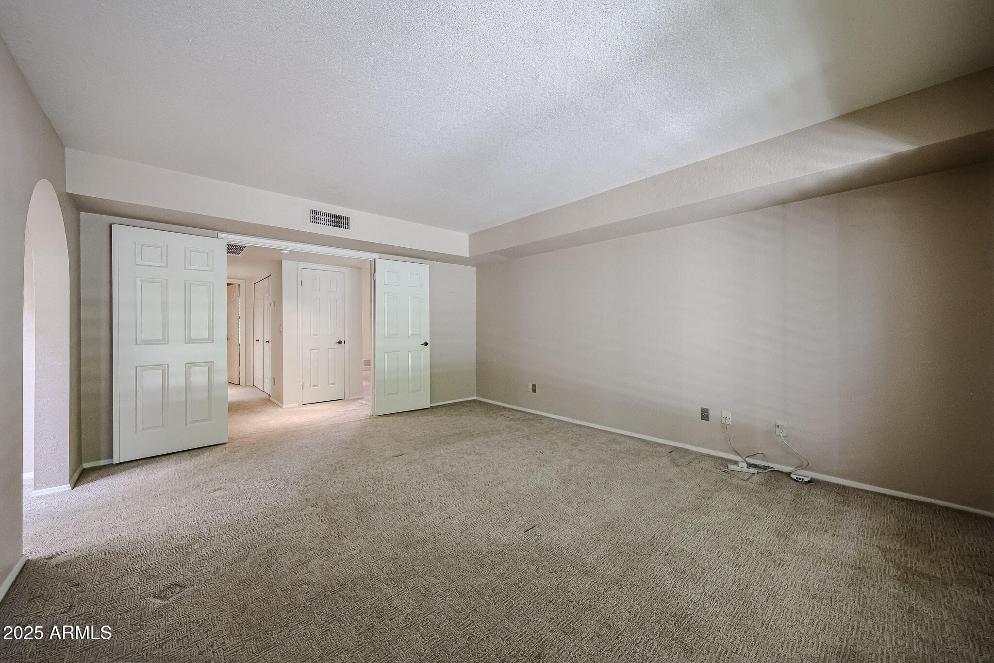 7834 East Ocotillo Road Scottsdale, AZ 85250 - Photo 20 of 47 a view of an empty room and closet area