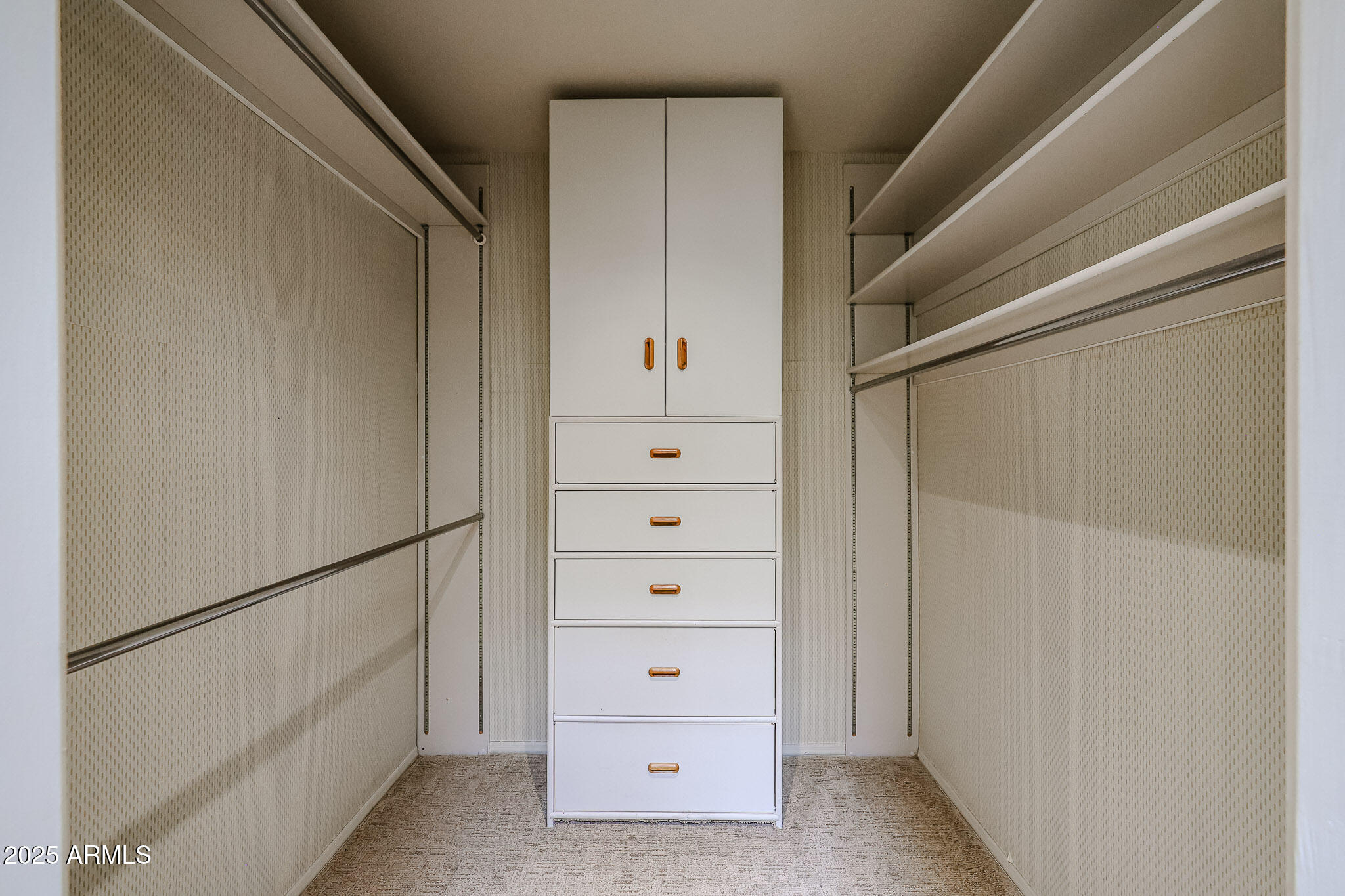 7834 East Ocotillo Road Scottsdale, AZ 85250 - Photo 22 of 47 a view of an empty walk in closet