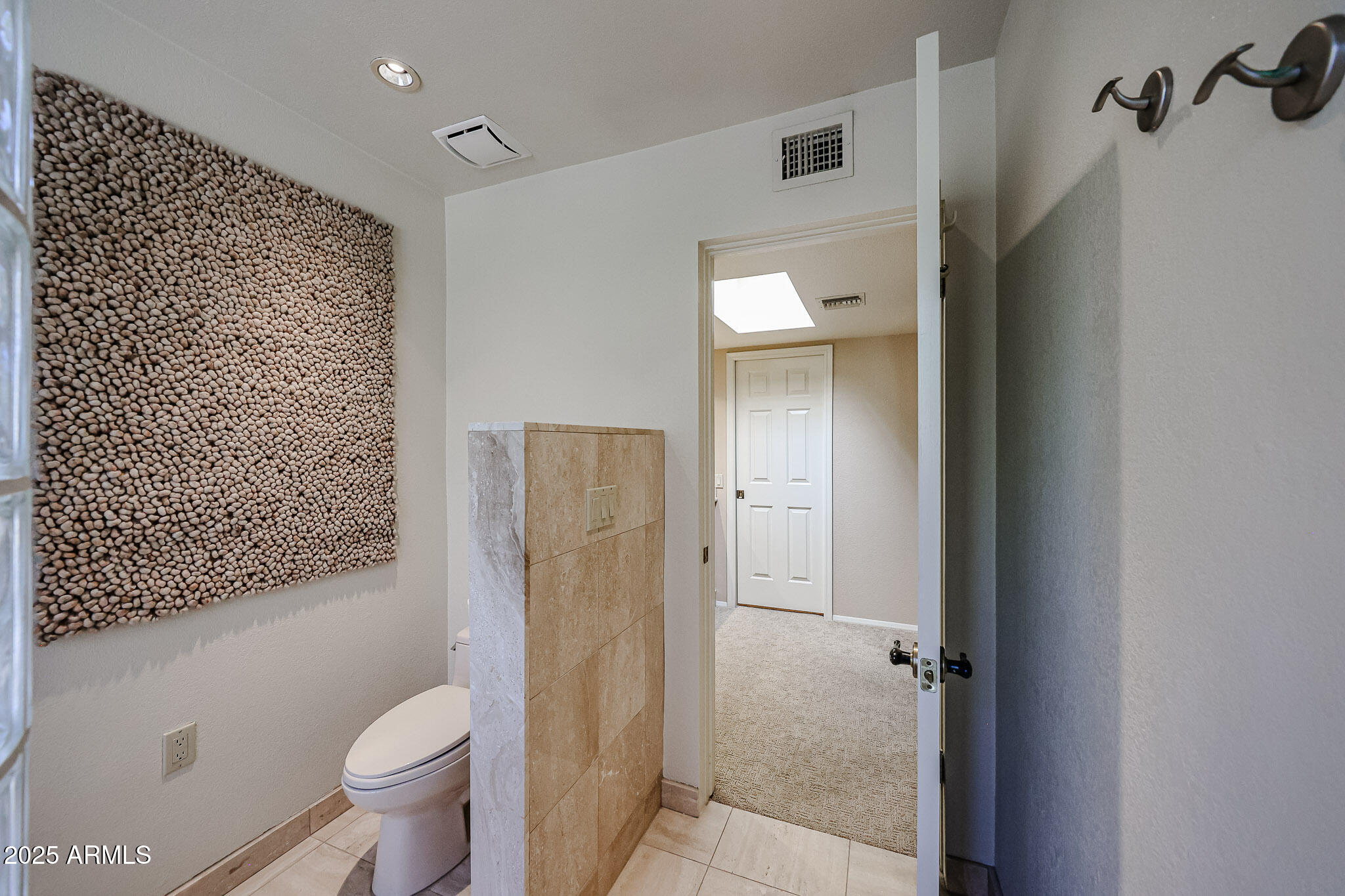 7834 East Ocotillo Road Scottsdale, AZ 85250 - Photo 25 of 47 a bathroom with a toilet and a shower