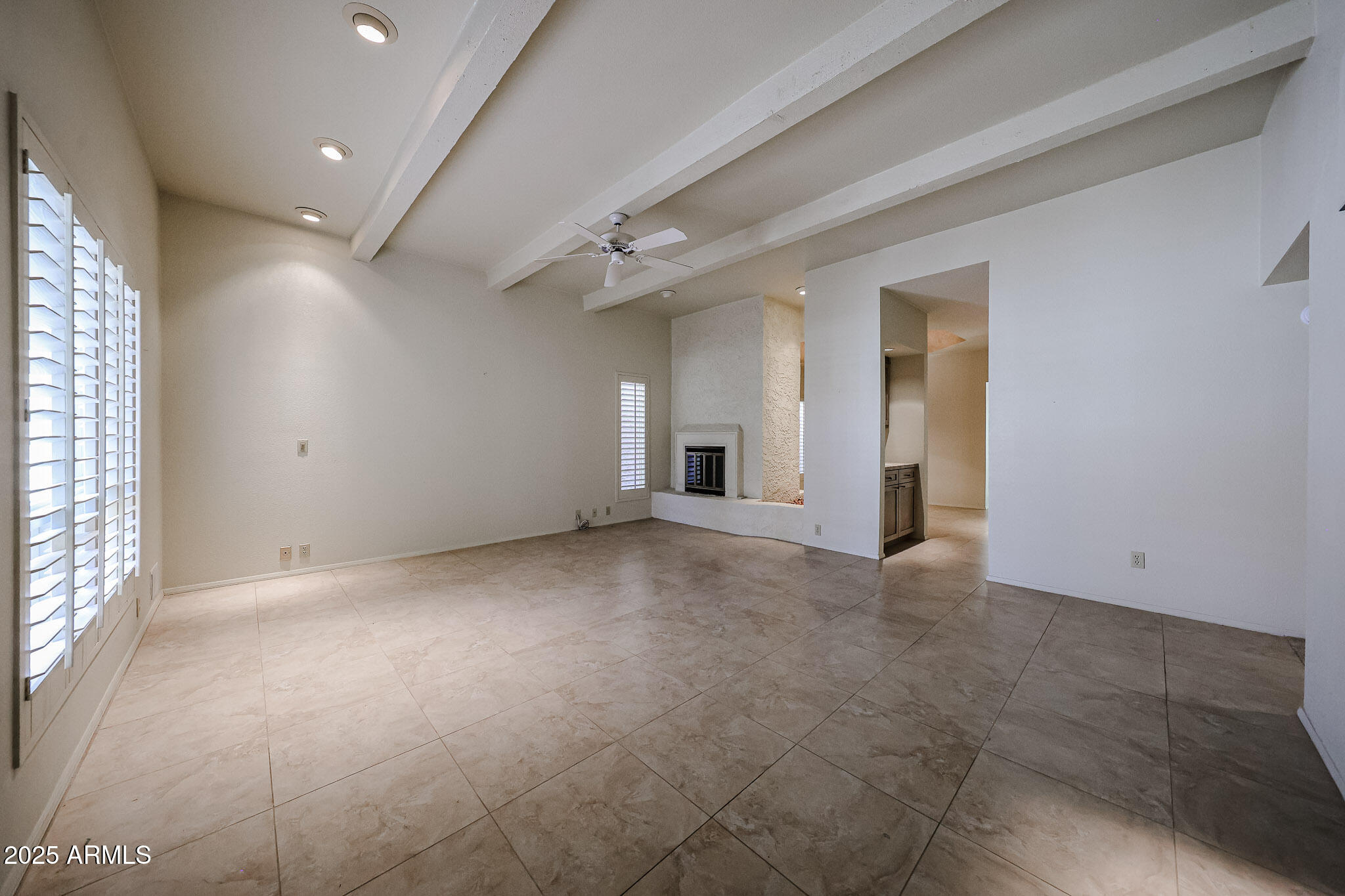7834 East Ocotillo Road Scottsdale, AZ 85250 - Photo 27 of 47 an empty room with windows and entrance