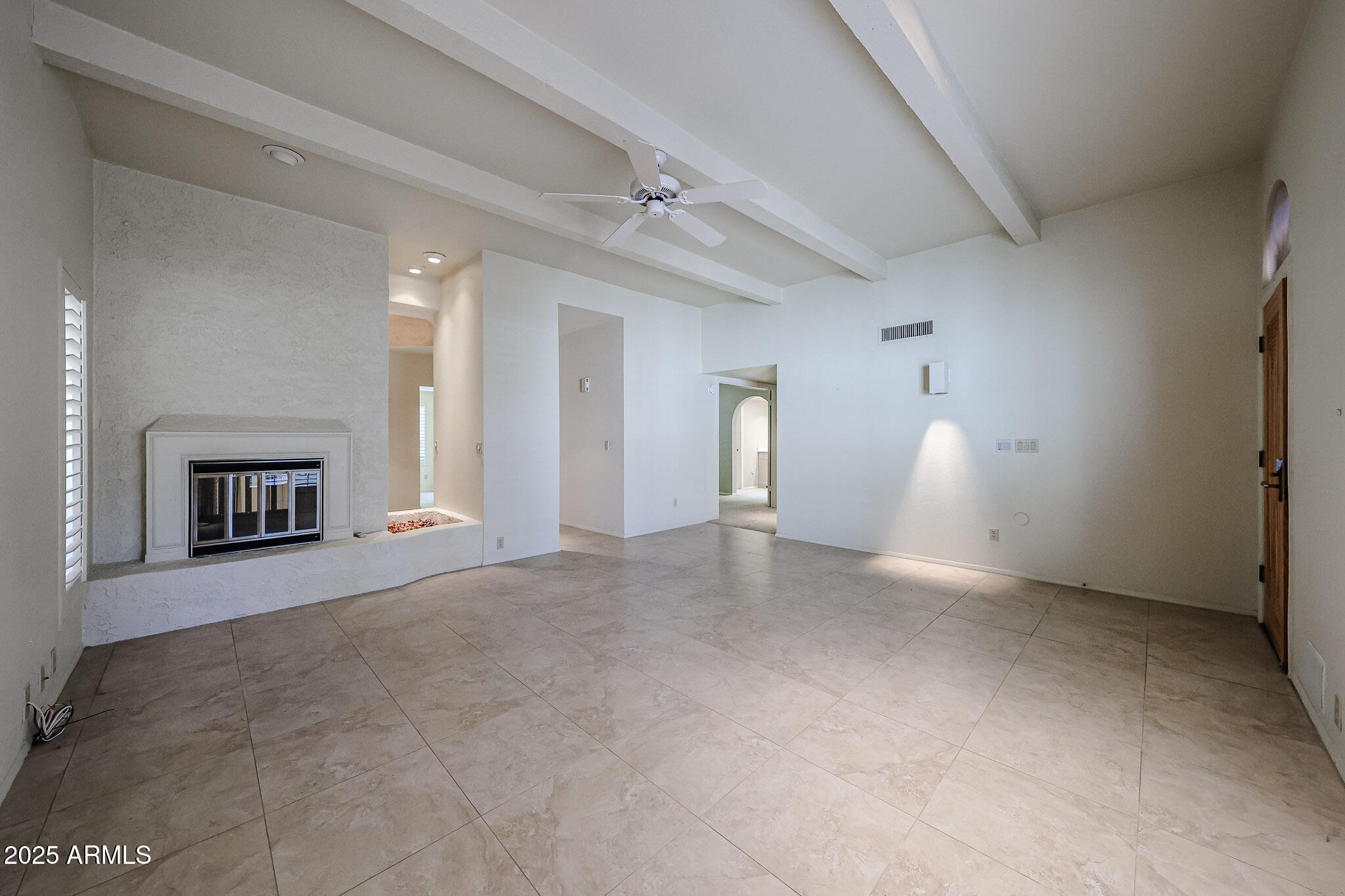 7834 East Ocotillo Road Scottsdale, AZ 85250 - Photo 30 of 47 a view of a livingroom with a fireplace