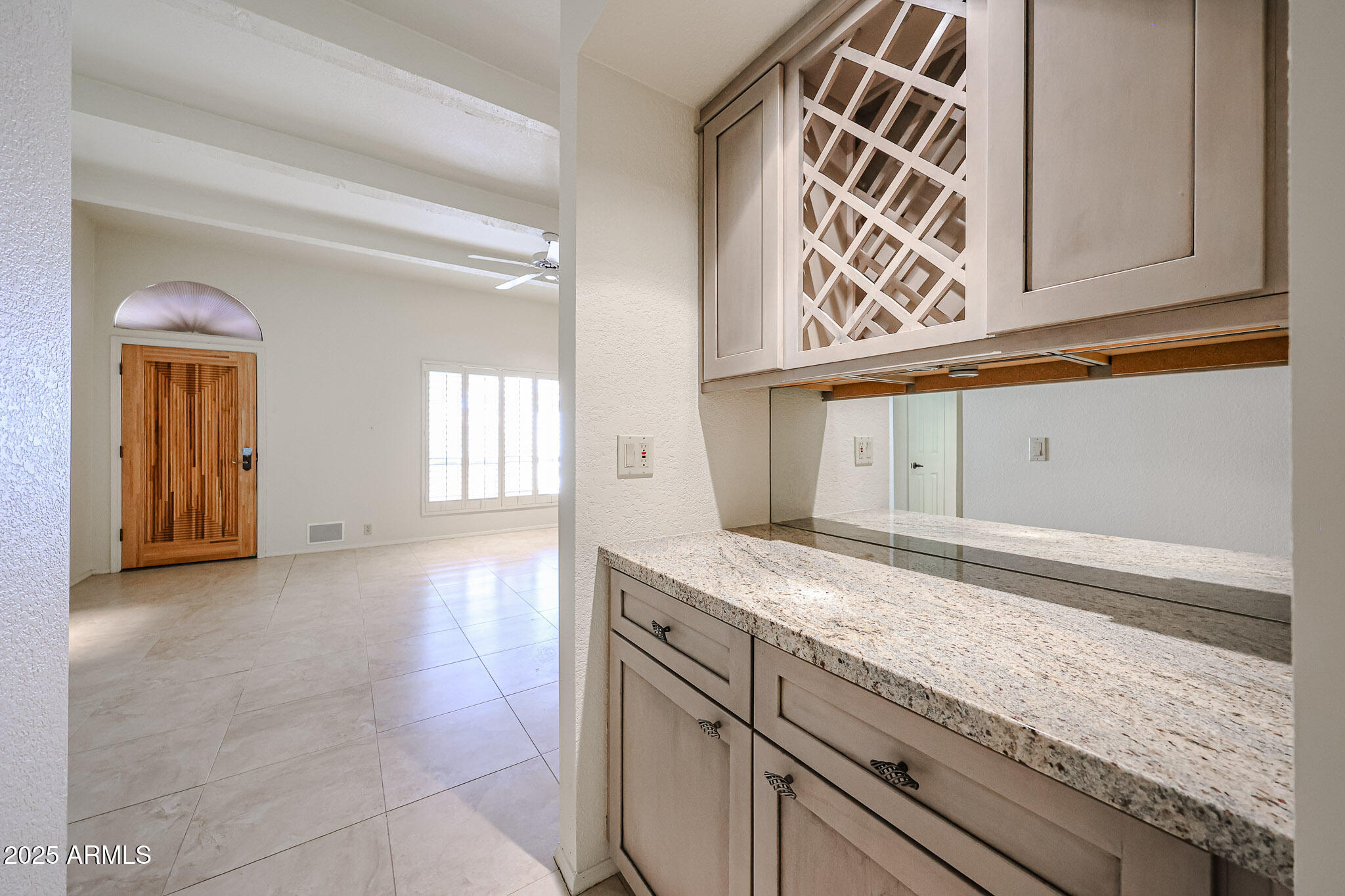 7834 East Ocotillo Road Scottsdale, AZ 85250 - Photo 33 of 47 a view of kitchen cabinets and window
