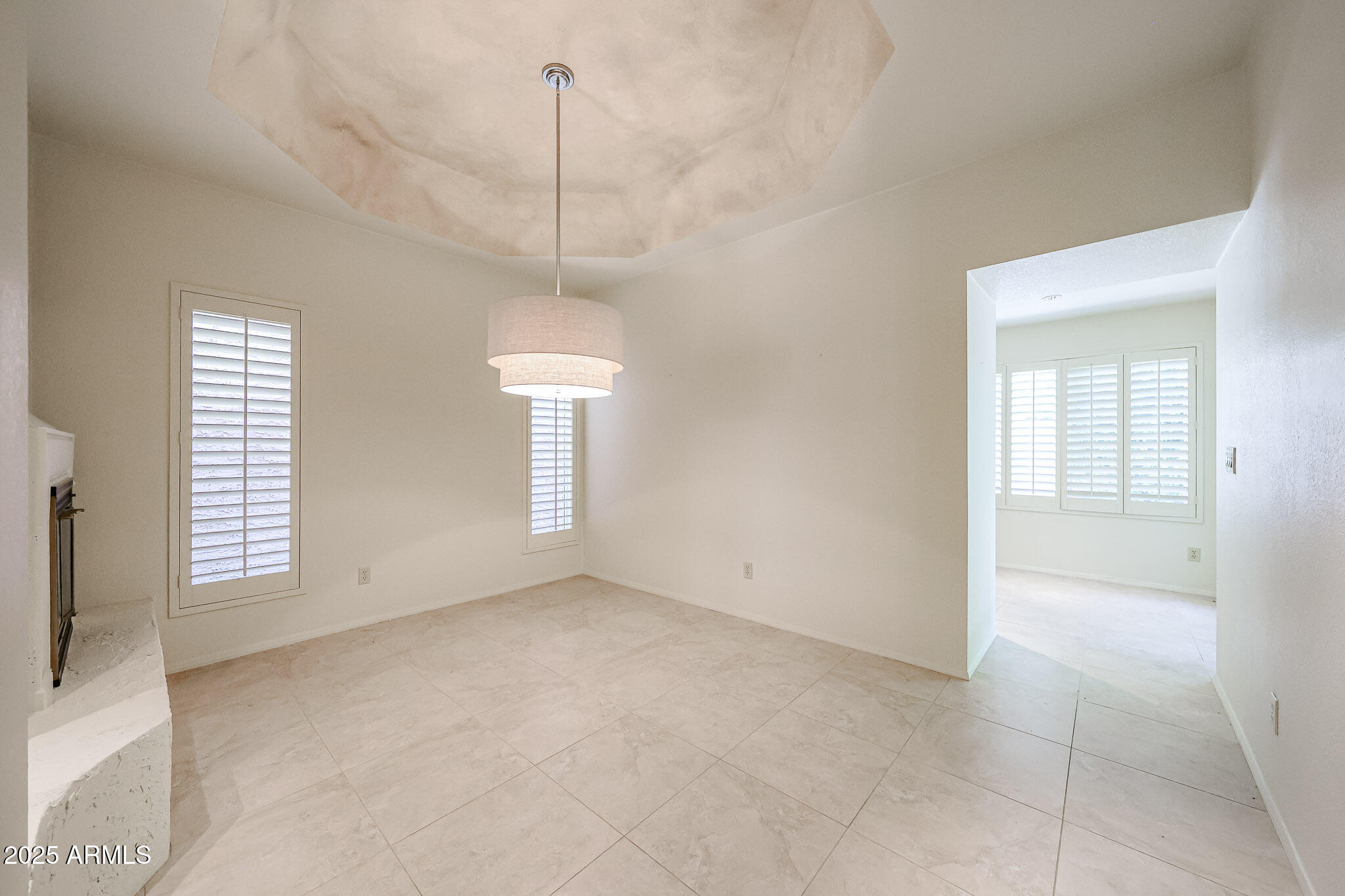 7834 East Ocotillo Road Scottsdale, AZ 85250 - Photo 34 of 47 a view of an empty room with a window