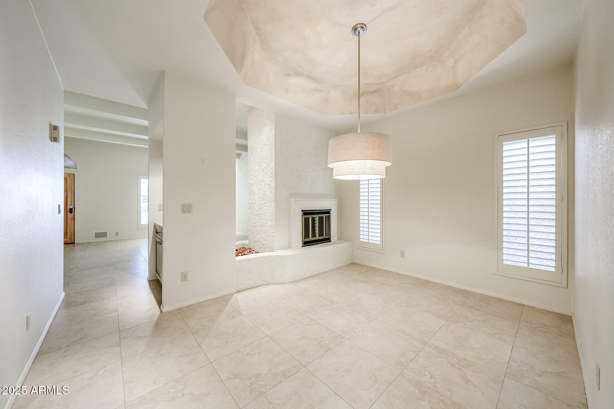 7834 East Ocotillo Road Scottsdale, AZ 85250 - Photo 35 of 47 a view of an empty room with a window