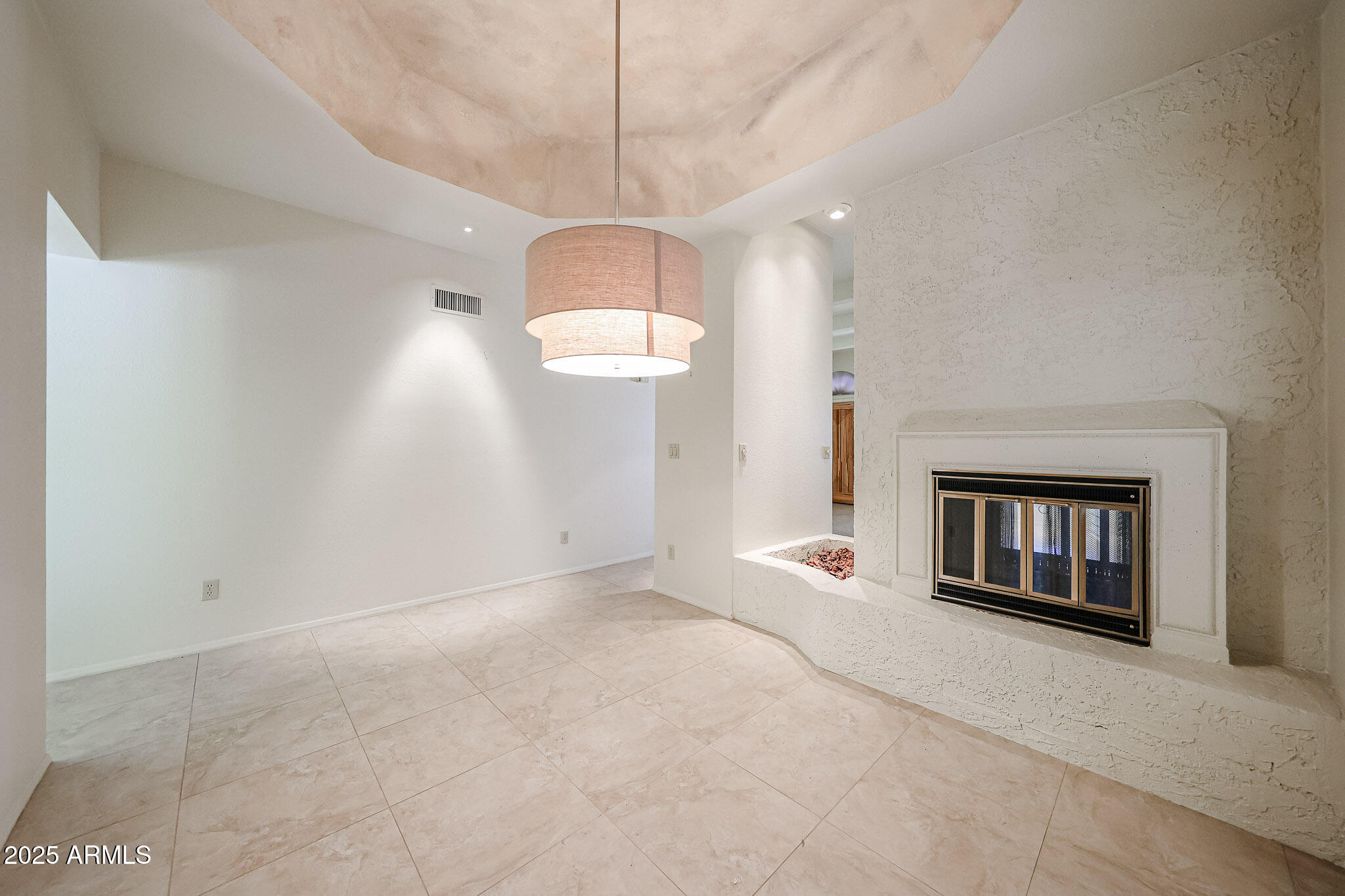 7834 East Ocotillo Road Scottsdale, AZ 85250 - Photo 36 of 47 an empty room with ceiling fan and windows