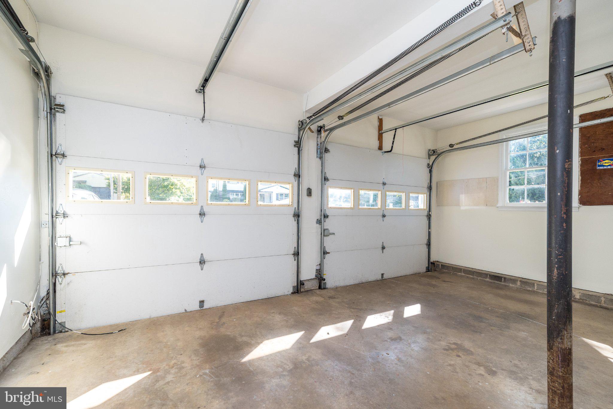 614 Brookhaven Road Wallingford, PA 19086 - Photo 36 of 49 2-car Garage with Openers; access to Family Rm