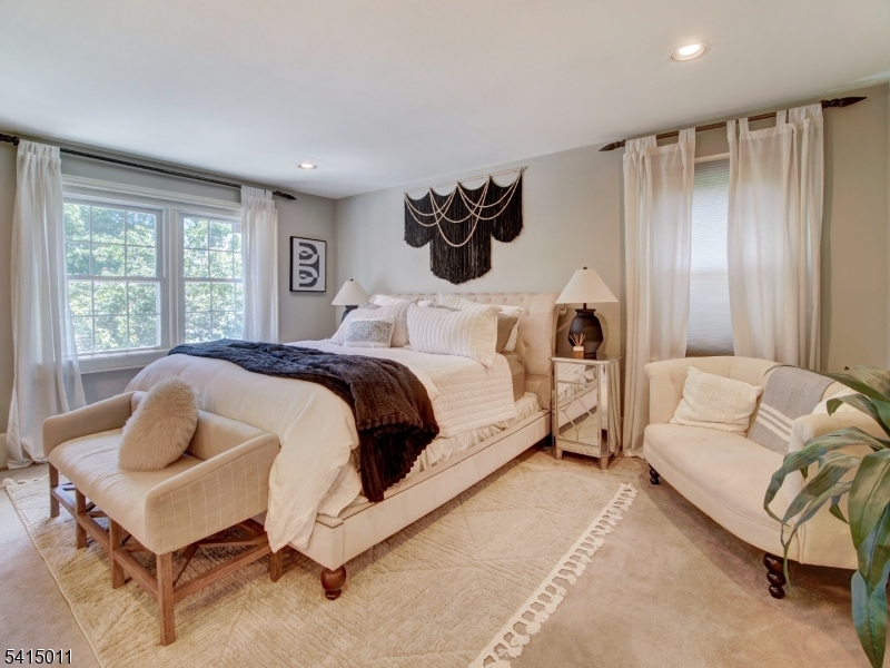 23 Ryerson Road Flemington, NJ 08822 - Photo 18 of 44 a spacious bedroom with a bed and a couch