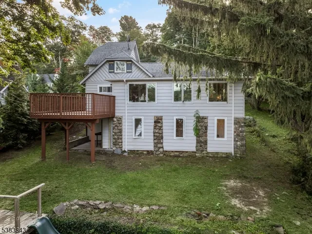 a view of a house with a roof deck