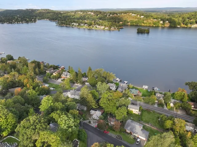 a view of a lake with a building in the background