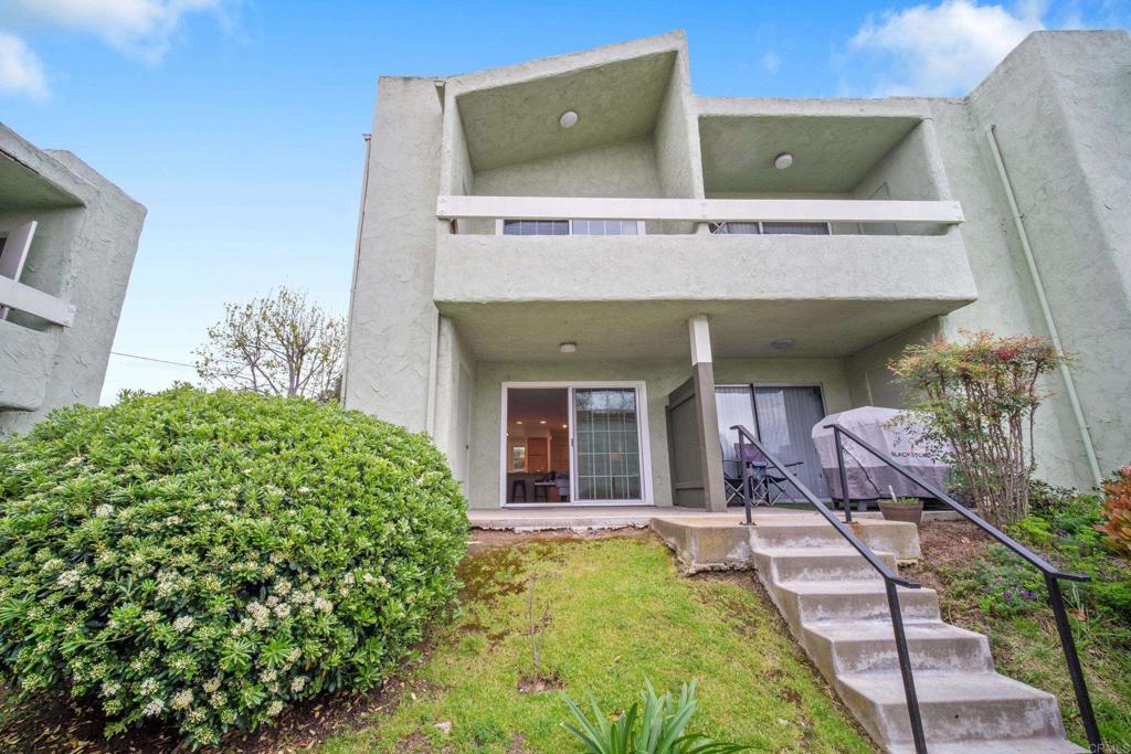 a view of a building with a garden