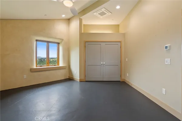 a bathroom with a sink double vanity and a mirror