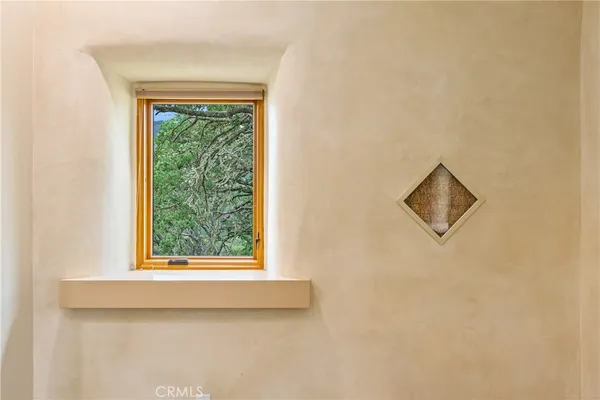 a view of a swimming pool with a balcony