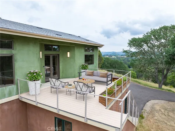 a view of a swimming pool with a patio