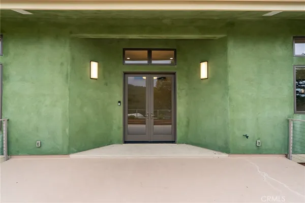 a view of a room that has a large window