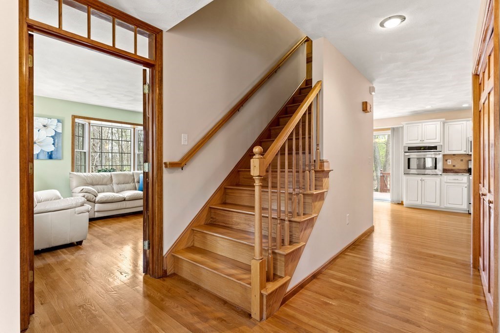 628 Boston Road Groton, MA 01450 - Photo 13 of 32 a view of entryway and hall with wooden floor