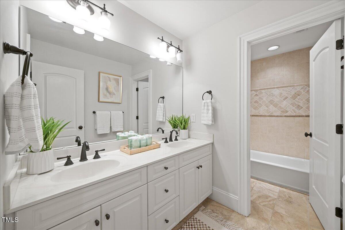 2507 Mayview Road Raleigh, NC 27607 - Photo 40 of 53 Hall bath with 2 sinks and separate room for toilet and shower