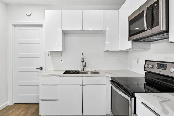 a view of an entryway with a kitchen island