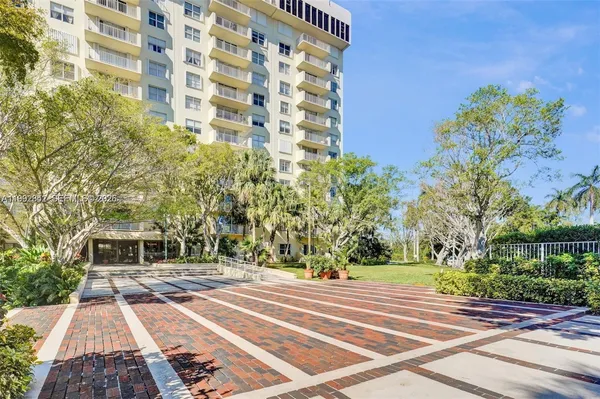 a view of a building with a street