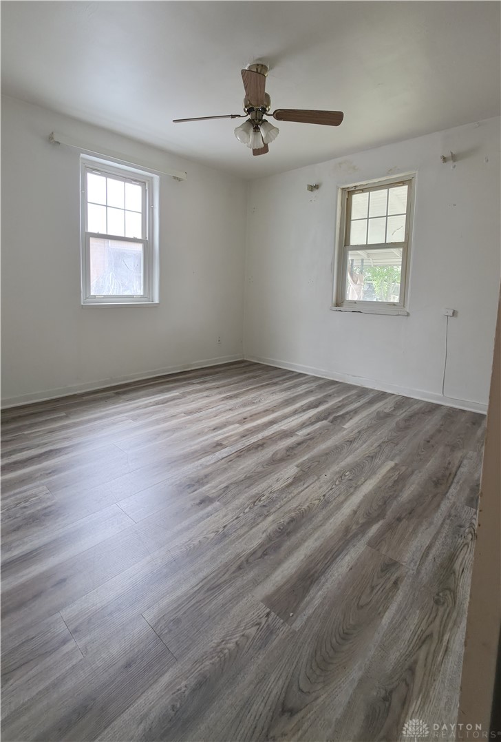 3109 Shroyer Road Kettering, OH 45429 - Photo 3 of 25 This bright room features durable flooring, offering a versatile space for comfortable living.