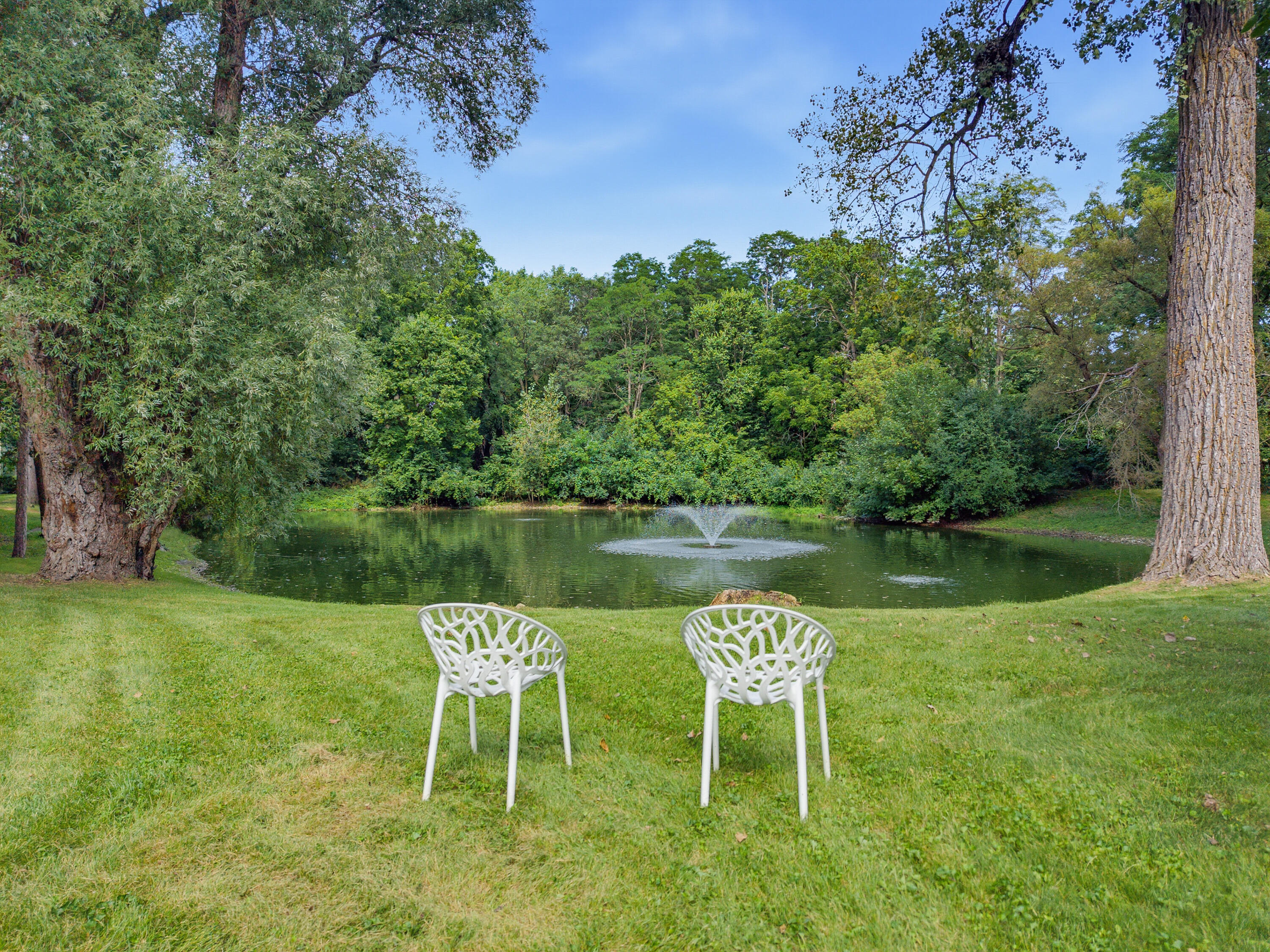 1730 West Green Tree Road, Unit 309 Glendale, WI 53209 - Photo 38 of 42 Sit back and relax with nature in all weather.