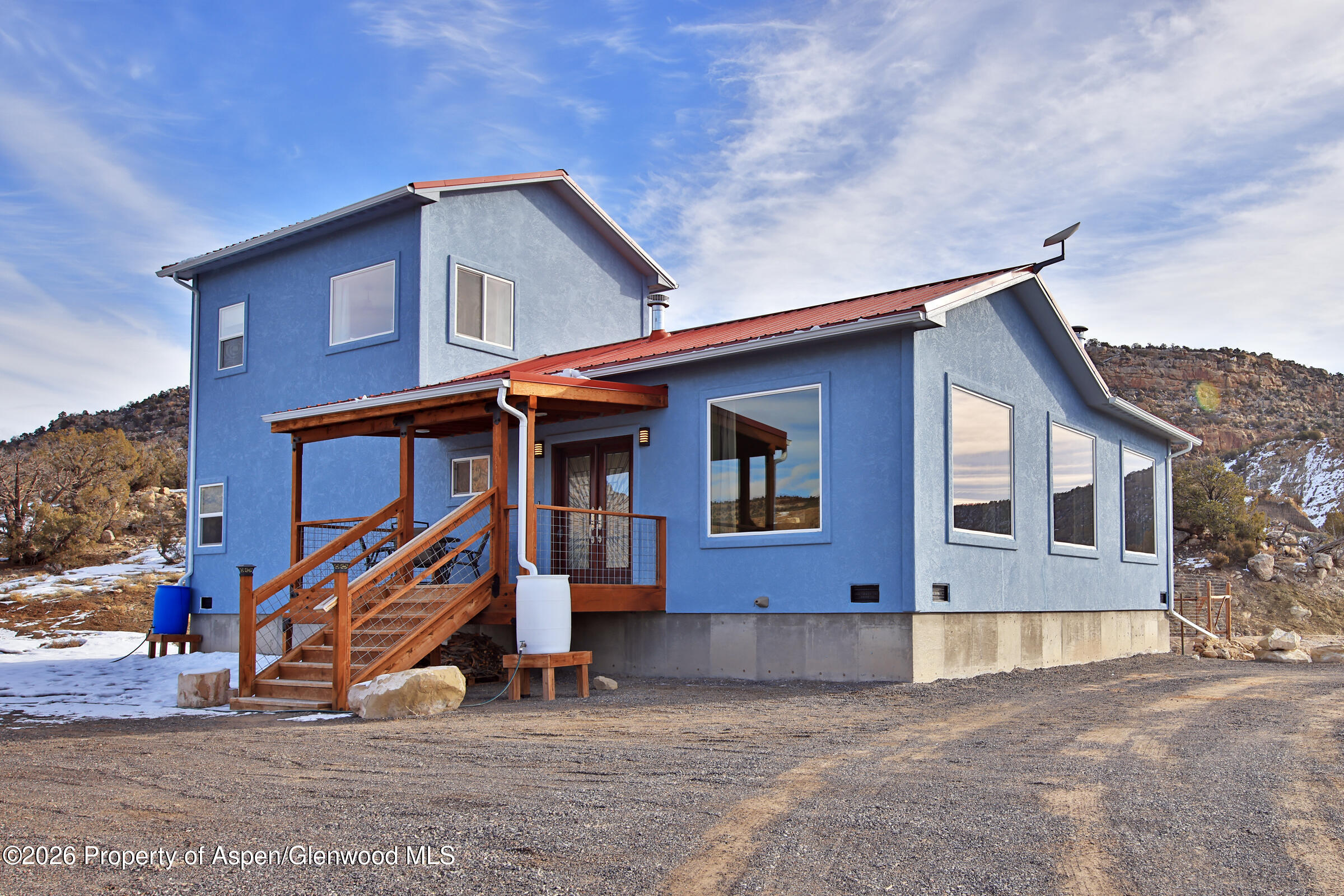 15086 45 45 1/2 Road De Beque, CO 81630 - Photo 1 of 40 a front view of a house with a yard