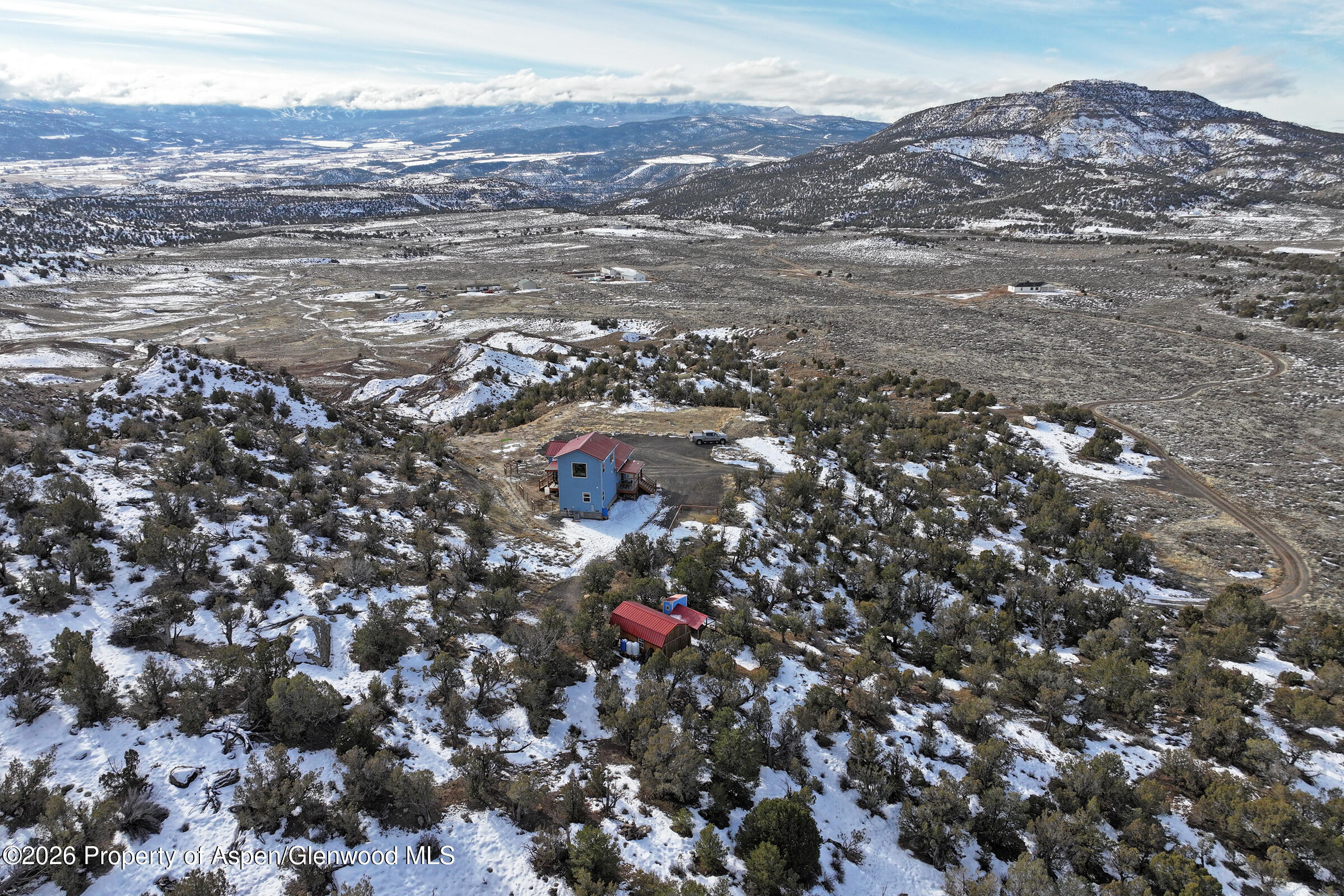 15086 45 45 1/2 Road De Beque, CO 81630 - Photo 23 of 40 an aerial view of house with yard and mountain view in back