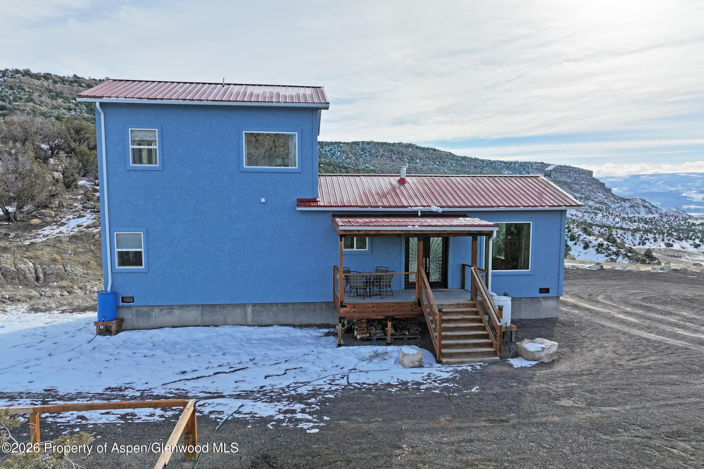15086 45 45 1/2 Road De Beque, CO 81630 - Photo 24 of 40 a backyard of a house with barbeque oven table and chairs