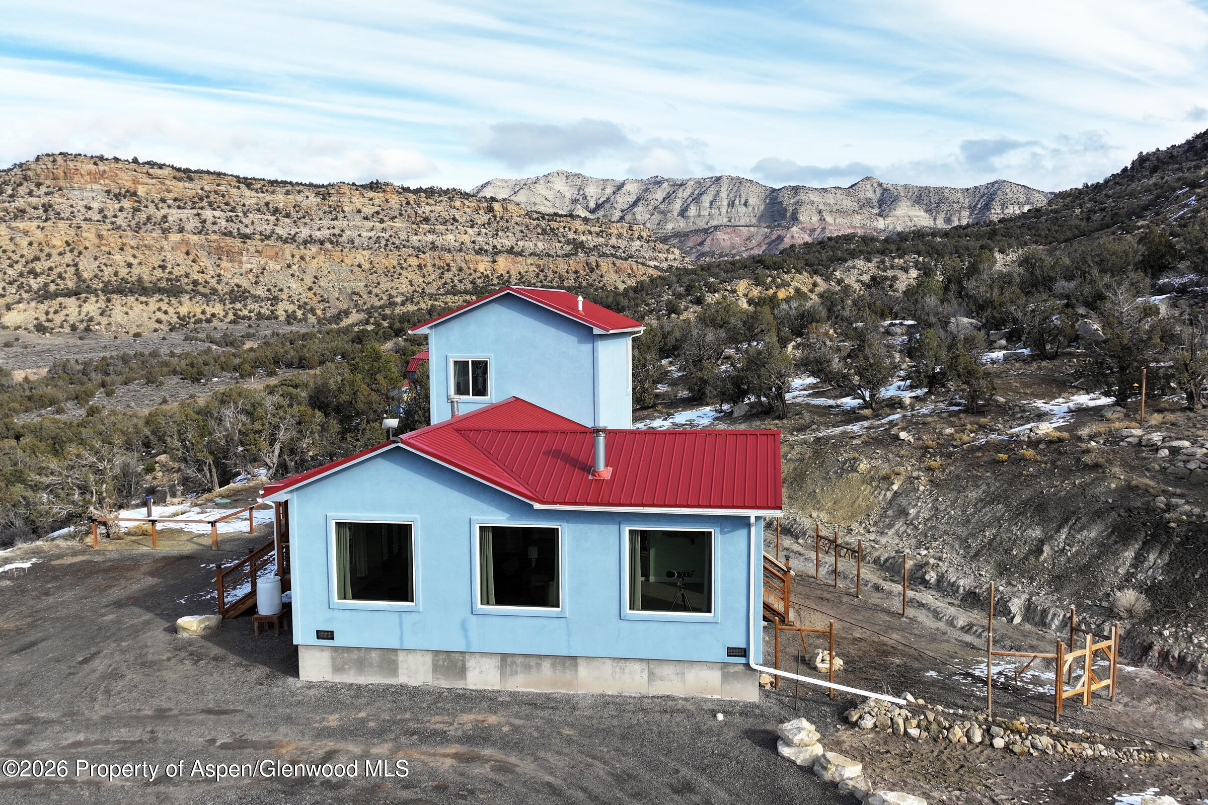 15086 45 45 1/2 Road De Beque, CO 81630 - Photo 25 of 40 a view of a house with a yard