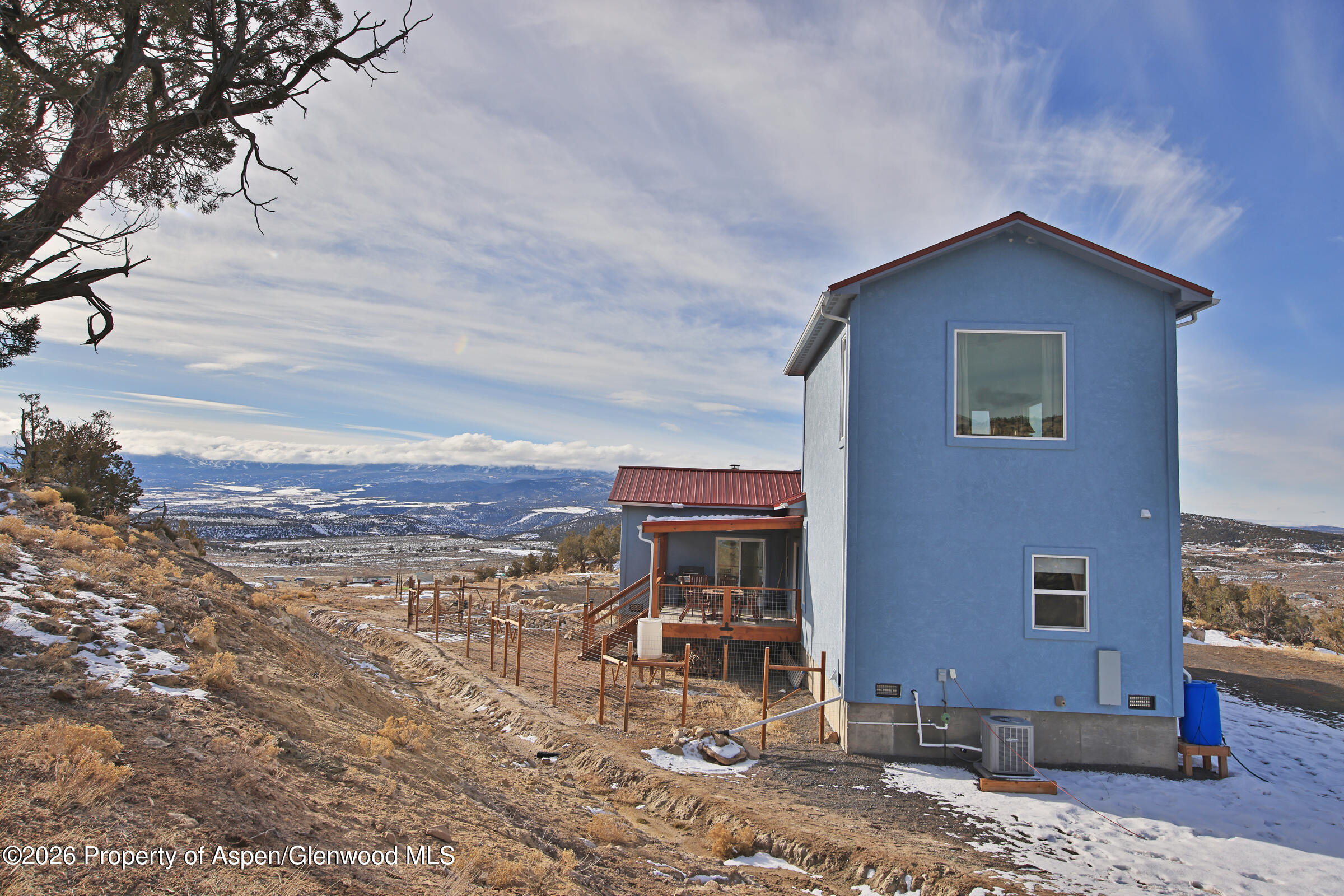 15086 45 45 1/2 Road De Beque, CO 81630 - Photo 26 of 40 a view of a house with a yard