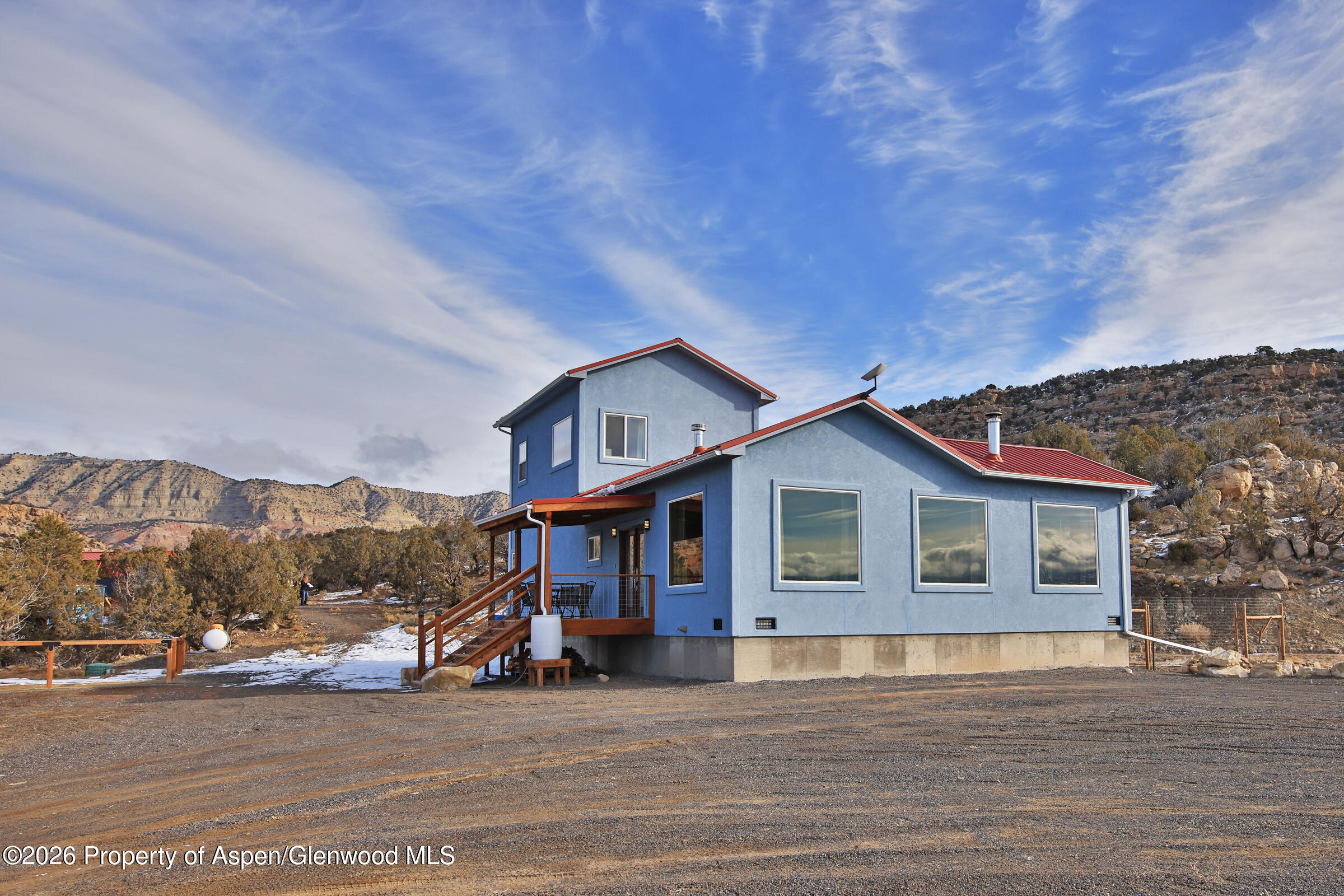 15086 45 45 1/2 Road De Beque, CO 81630 - Photo 27 of 40 a view of a house next to a road